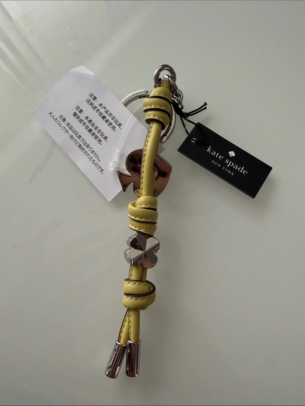 kate spade Yellow Leather Knot Tassel Key & Card Holder with Clover Accent